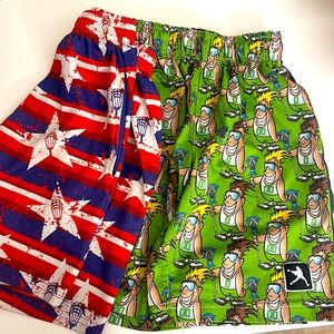 2 pair of youth size small lacrosse shorts/ lacrosse unlimited